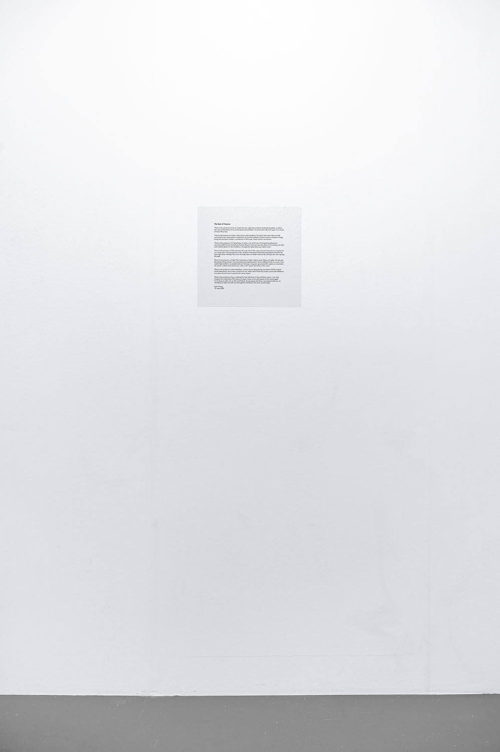 Text glued to the wall of the exhibition space at CAN in Neuchatel, part of "Parallels - Part 2 : The Commuter"